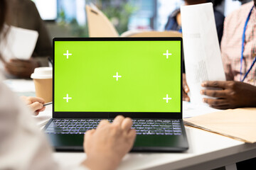 Investors group gathering in a meeting with chroma key screen on pc, discussing about potential...
