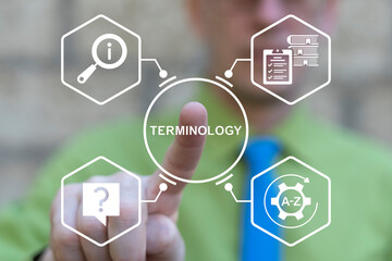 Business person using virtual touch screen push the text: TERMINOLOGY. Concept of terminology....
