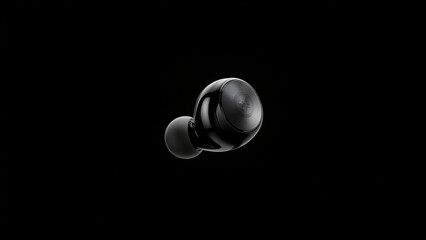 Sleek Black Wireless Earbud with Subtle Reflective Logo on a Dark Seamless Background - High-Tech Audio