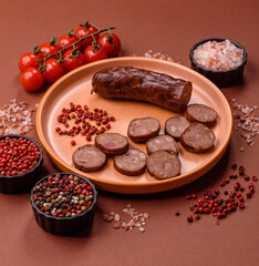 Homemade meat or vegan sausage grilled with spices. Homemade sausage cooked on barbecue