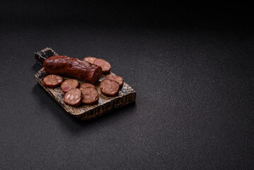 Homemade meat or vegan sausage grilled with spices. Homemade sausage cooked on barbecue