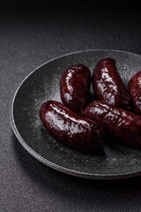 Blood sausage, pudding, meat food with lard and spices. Blood sausage