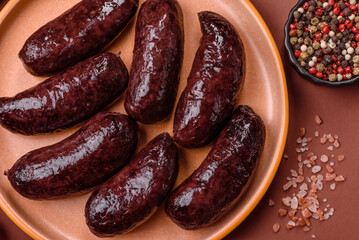 Blood sausage, pudding, meat food with lard and spices. Blood sausage