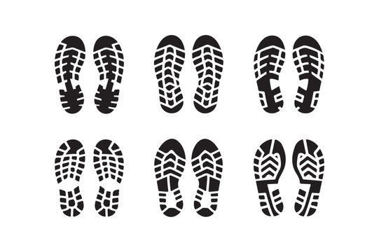 Collection of six black shoe sole imprints on a white background