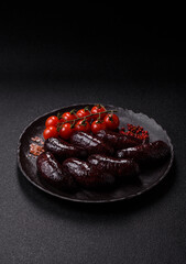 Blood sausage, pudding, meat food with lard and spices. Blood sausage