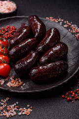 Blood sausage, pudding, meat food with lard and spices. Blood sausage