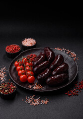 Blood sausage, pudding, meat food with lard and spices. Blood sausage