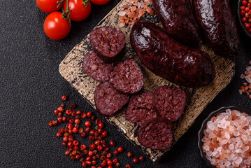 Blood sausage, pudding, meat food with lard and spices. Blood sausage