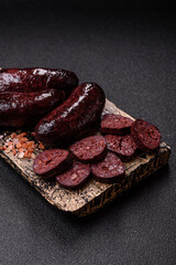 Blood sausage, pudding, meat food with lard and spices. Blood sausage