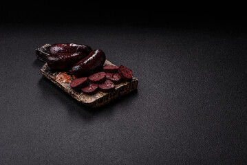 Blood sausage, pudding, meat food with lard and spices. Blood sausage