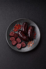 Blood sausage, pudding, meat food with lard and spices. Blood sausage