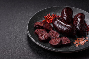 Blood sausage, pudding, meat food with lard and spices. Blood sausage