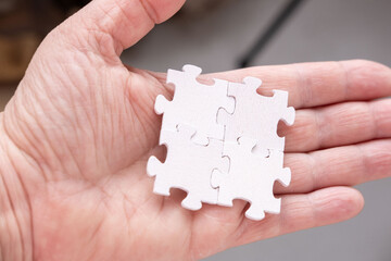 Jigsaw wooden white puzzle pieces, problem-solving and creative thinking, concept idea, level mind,...