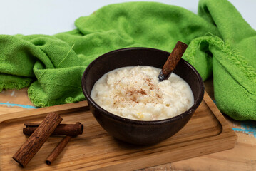 Delicious Brazilian dessert known as canjica. Selective focus.