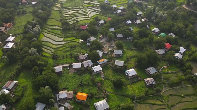 Aerial view of agricultural fields and village, Pakistan.