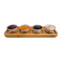 Set of four round glass bowls with assorted jams and spreads on ornate metal coasters and wooden tray, perfect for gourmet breakfasts, catering, and elegant table presentations