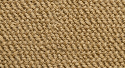 Close-up of warm beige knitted fabric, highlighting textured yarn and intricate patterns. Soft lighting enhances the fabric's warmth and depth. Cozy, inviting atmosphere.