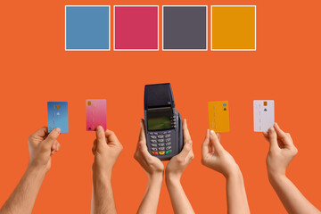 Hands with payment terminal and credit cards on orange background. Different color patterns