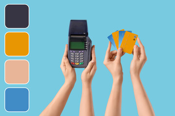 Hands holding payment terminal with credit cards on blue background. Different color patterns
