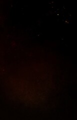 Ember particles floating within the darkness