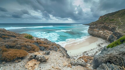 Waves crash on sandy shores at a northern peninsula on a cloudy day