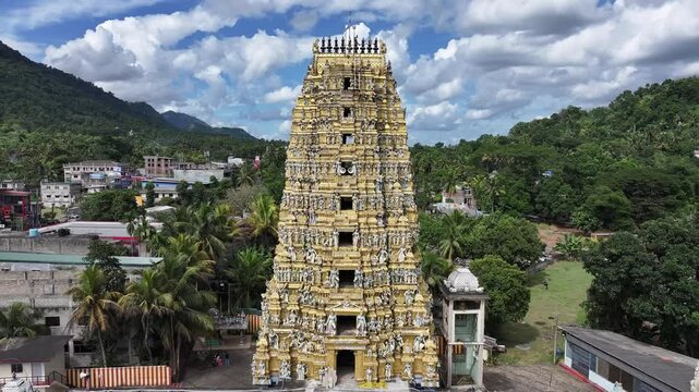 Aerial view of ornate temple surrounded by greenery, Sri Lanka.