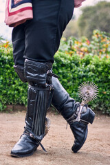 View of the feet or legs of a Chilean huaso, posing and showing details of his traditional attire,...