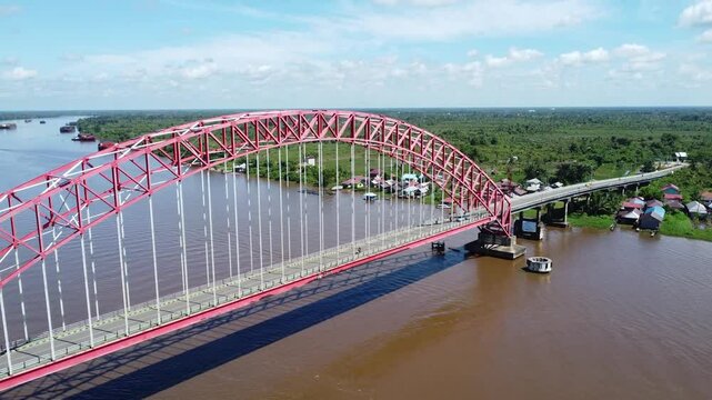 View from the top of the Rumpiang Bridge, located in South Kalimantan, Indonesia, as a link across the very wide Barito River
