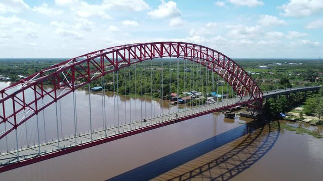 View from the top of the Rumpiang Bridge, located in South Kalimantan, Indonesia, as a link across the very wide Barito River