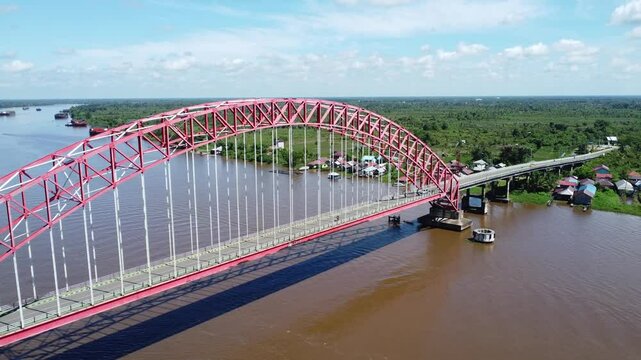 View from the top of the Rumpiang Bridge, located in South Kalimantan, Indonesia, as a link across the very wide Barito River