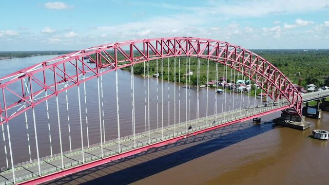 View from the top of the Rumpiang Bridge, located in South Kalimantan, Indonesia, as a link across the very wide Barito River