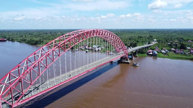 View from the top of the Rumpiang Bridge, located in South Kalimantan, Indonesia, as a link across the very wide Barito River
