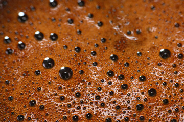 Macro shot of coffee froth as background