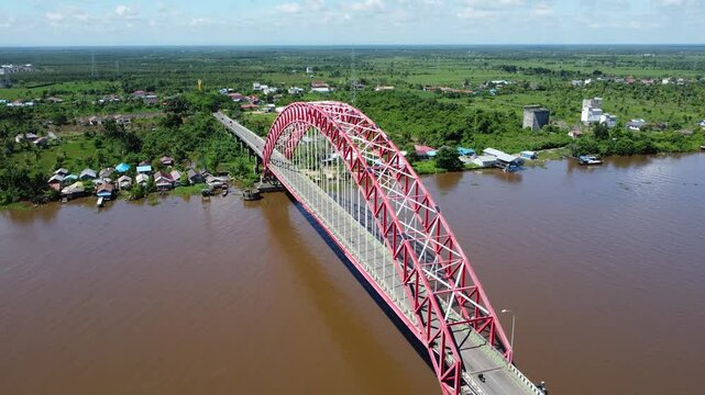 View from the top of the Rumpiang Bridge, located in South Kalimantan, Indonesia, as a link across the very wide Barito River