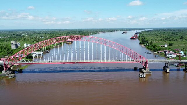 View from the top of the Rumpiang Bridge, located in South Kalimantan, Indonesia, as a link across the very wide Barito River