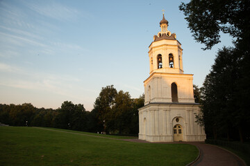 Beautiful old bell architecture building from white marble on nature bright sunny sunset light and...