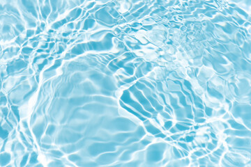 Blue water with ripples on the surface. Defocus blurred transparent blue colored clear calm water...