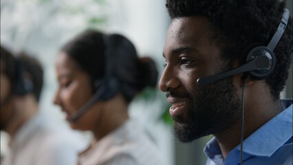 Callcenter headshot African operator in headset support customer helpline online sales business...