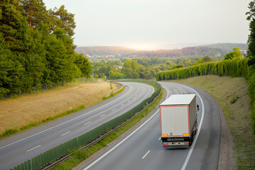 Modern Freight Truck Driving Through Supply-Chain Logistics Route - Polish Highway
