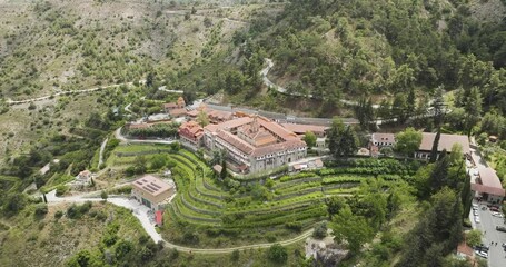 Aerial view of monastery surrounded by mountains, Cyprus. - Powered by Adobe