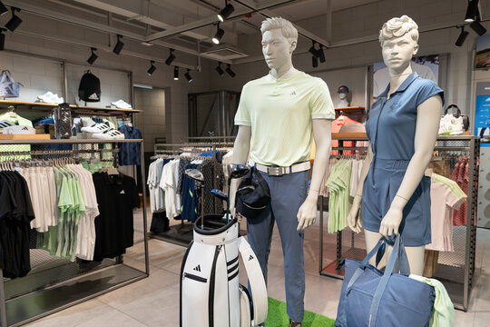 Petaling Jaya, Malaysia - July 14, 2024: dressed mannequins displayed inside Adidas store at Sunway Pyramid shopping mall.