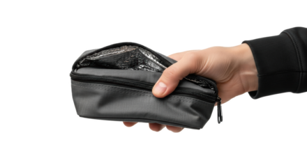 Hand holding a gray zippered insulated bag with silver lining partially open on black background