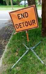 END DETOUR sign on residential easement