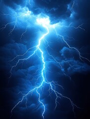 Fototapeta premium Bright blue lightning bolts striking through dark stormy clouds illuminating the turbulent night sky