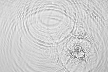 Texture of water drops on white background, closeup