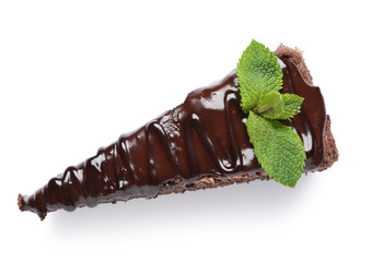 Piece of tasty chocolate cake and mint leaves isolated on white background, closeup