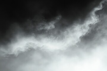 Dense white smoke or fog swirling against a dark background, creating a mysterious and ethereal atmosphere