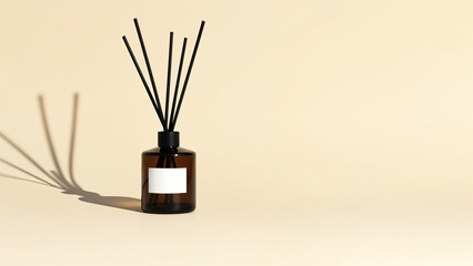 A glass bottle with rattan sticks emitting a soothing aroma, enhancing home ambiance against a light background