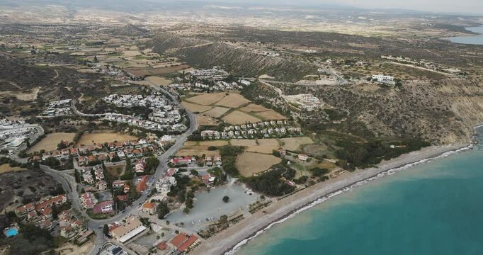 Aerial view of coastal village by the beach, Cyprus.