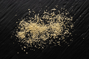 Panko, Japanese breadcrumbs scattered on a dark background